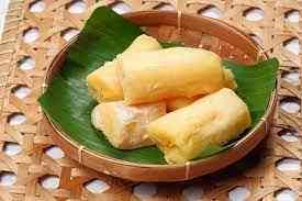 Pressing/fermenting cassava